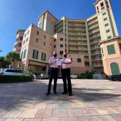 Pink Shell staff holding seal of commitment