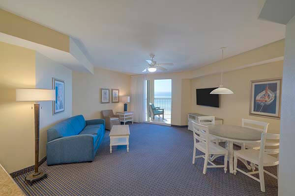 Spacious living and dining area in beachfront resort villas in Fort Myers Florida