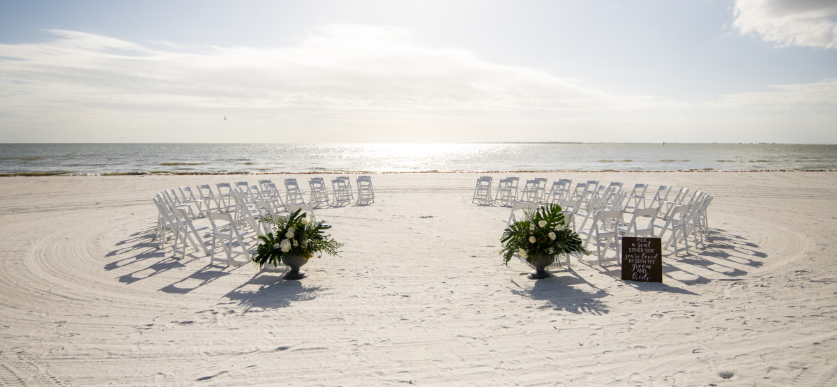 Wedding arch setup on the private beach at Pink Shell Resort